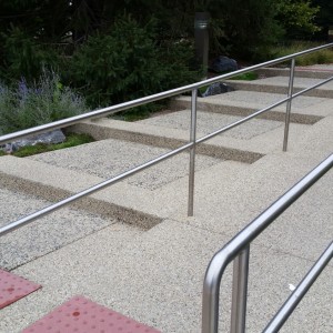 Exposed aggregate handicap ramp and custom blend stairs exposed aggregate